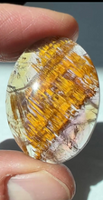 Load image into Gallery viewer, Cacoxenite in Quartz Cabochon with Amethyst