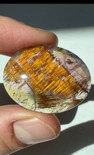 Load image into Gallery viewer, Cacoxenite in Quartz Cabochon with Amethyst
