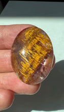 Load image into Gallery viewer, Cacoxenite in Quartz Cabochon with Amethyst
